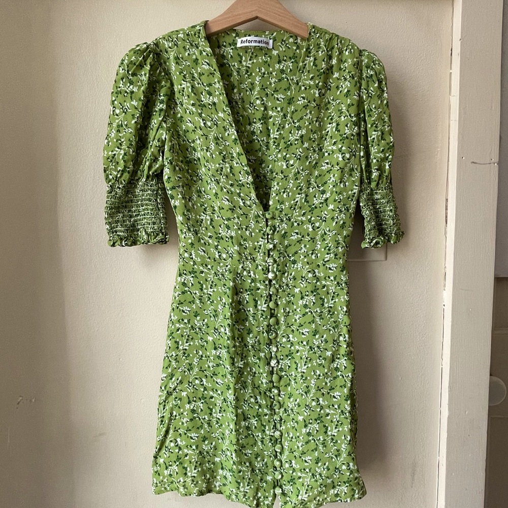 Green Reformation dress in size zero with buttons running down & floral pattern!